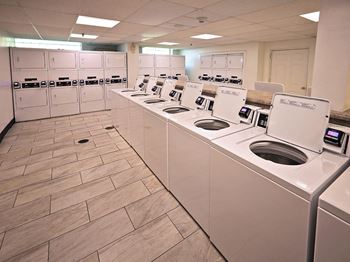 Coinless laundry centers